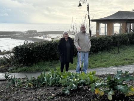 Volunteers Cheryl and Alan Reynolds at the community garden